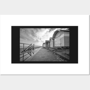 Traditional wooden beach huts on the Norfolk coast Posters and Art